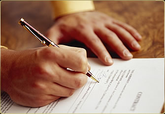 signing-mortgage Signing a Mortgage Document